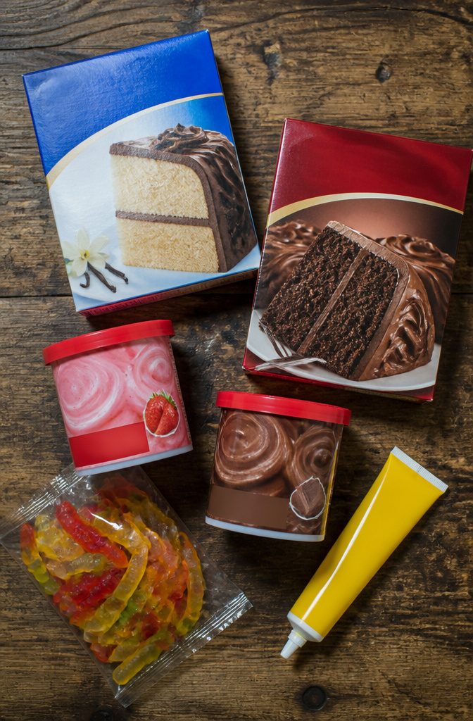 Ingredients for Max and Ruby cake including vanilla and chocolate cake mixes.
